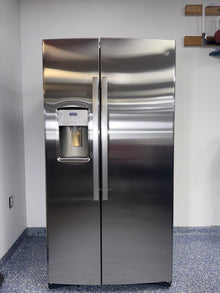 The GE GSS25IYNFS refrigerator from the front, a side-by-side model for a great deal in Kansas.
