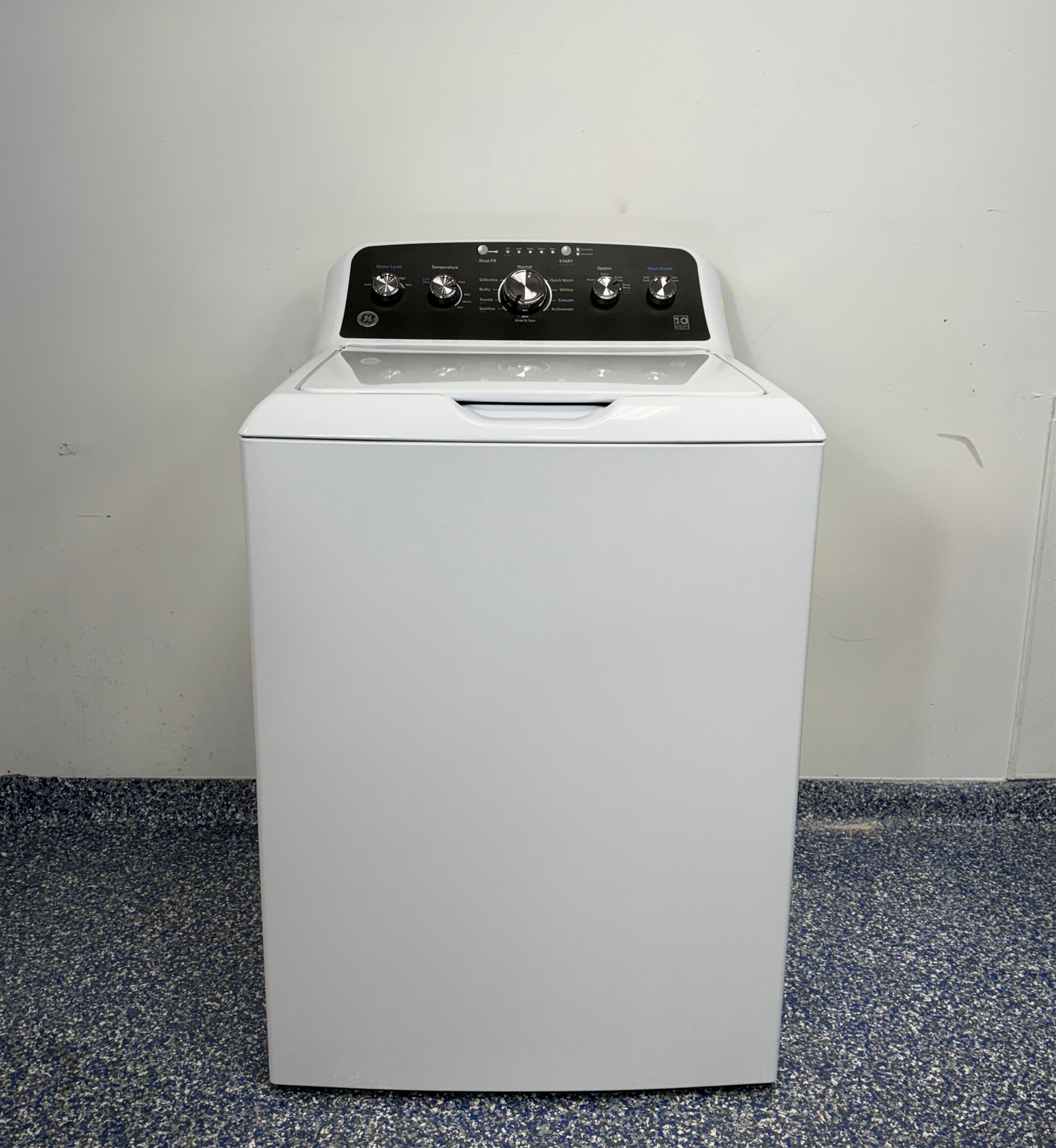The GE GTW485ASW0WB top load washer from the front, a dependable model for a great deal in Kansas.