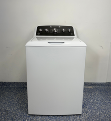 The GE GTW485ASW0WB top load washer from the front, a dependable model for a great deal in Kansas.
