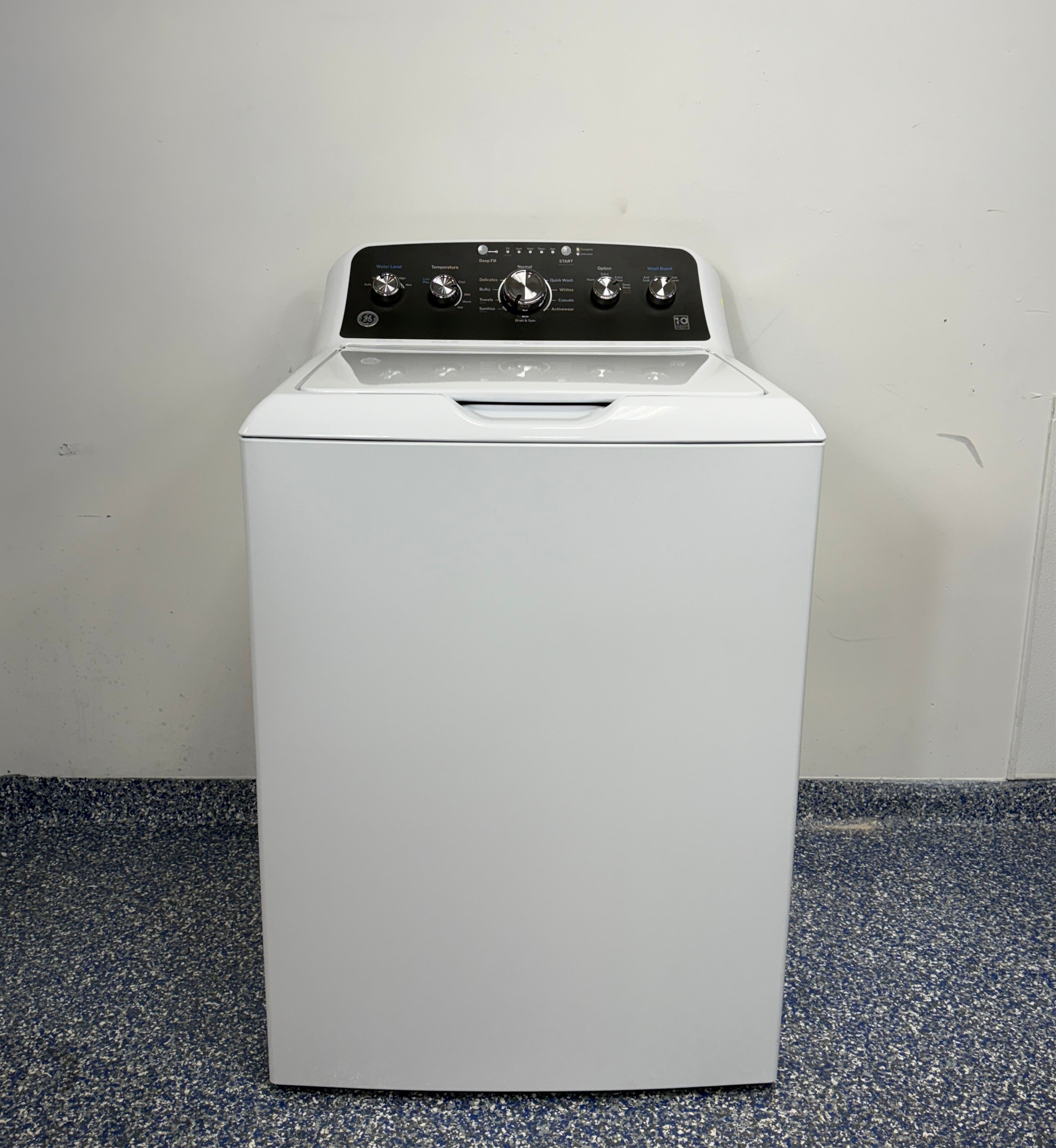 The GE GTW485ASW0WB top load washer from the front, a dependable model for a great deal in Kansas.
