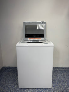 A close-up of the GE GTW585BSVWS stainless steel basket, designed to protect fabrics while delivering a deep clean.