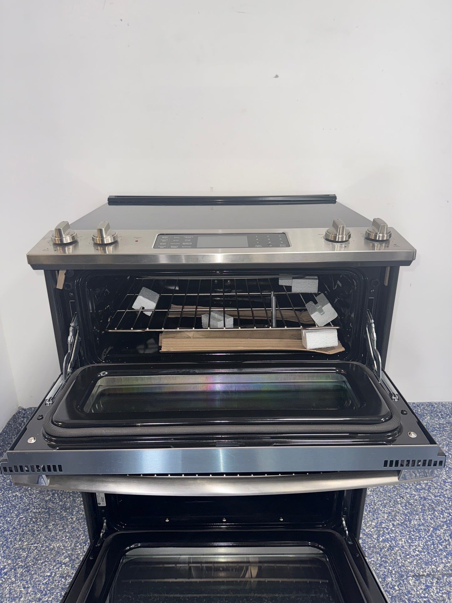 Open view showing upper and lower ovens of the GE JSS86SP8SS double oven range, featured in Kansas City homes.