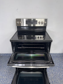 Double oven interior of GE Profile PB965YP5FS electric range in a Kansas City kitchen.