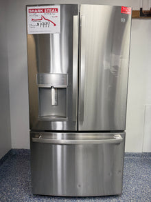 Front view of the GE Profile PFE28KYNFS 27.7 cu ft French-Door Refrigerator in Fingerprint Resistant Stainless Steel. On sale at Appliance Shark - Scratch & Dent store | Kansas City.