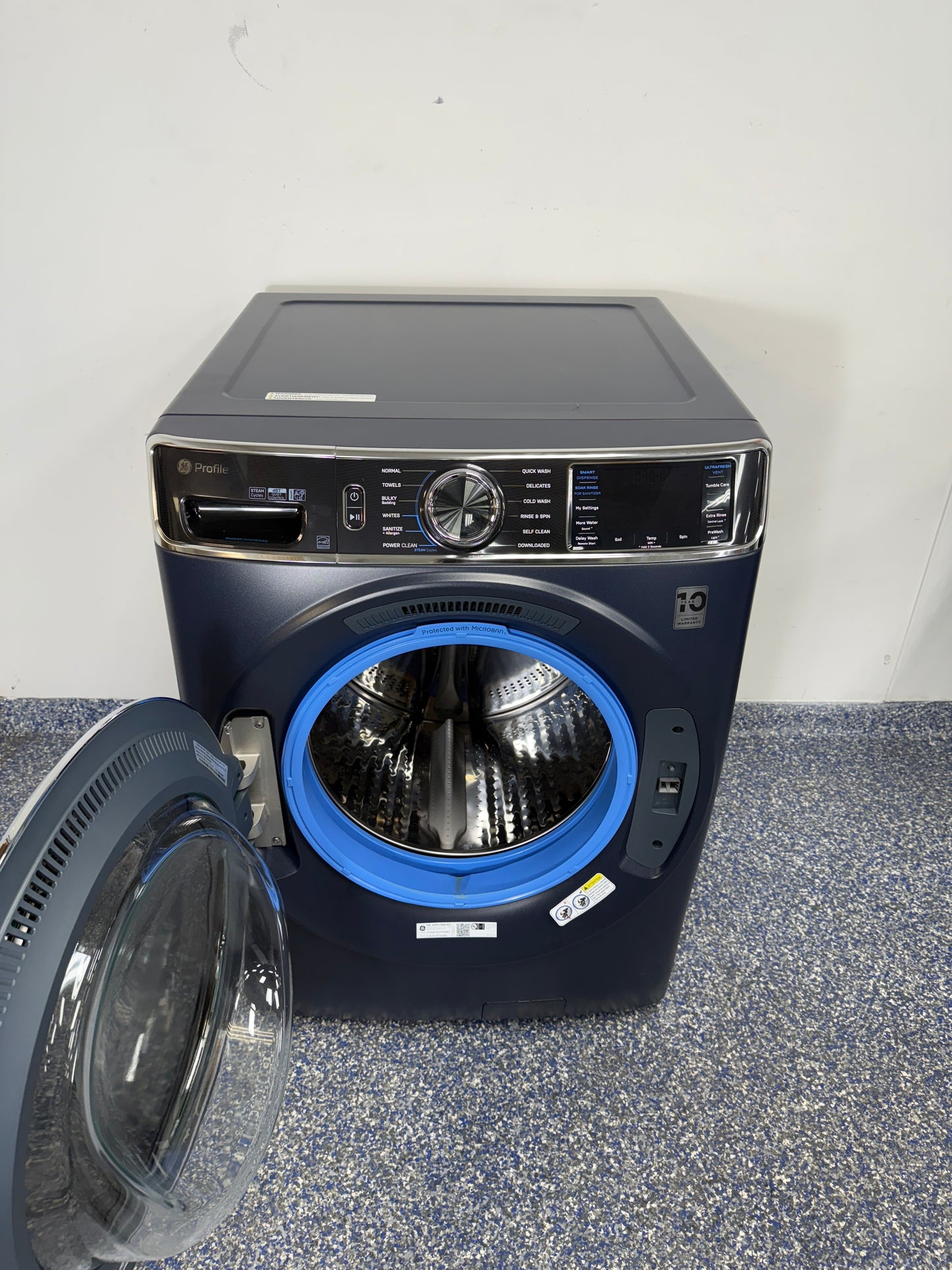 Control panel of GE PFW870SPV0RS front load washer in an Overland Park home.