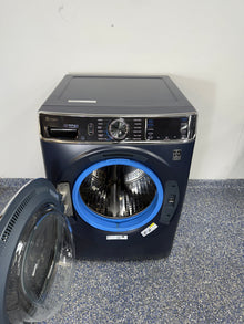 Control panel of GE PFW870SPV0RS front load washer in an Overland Park home.