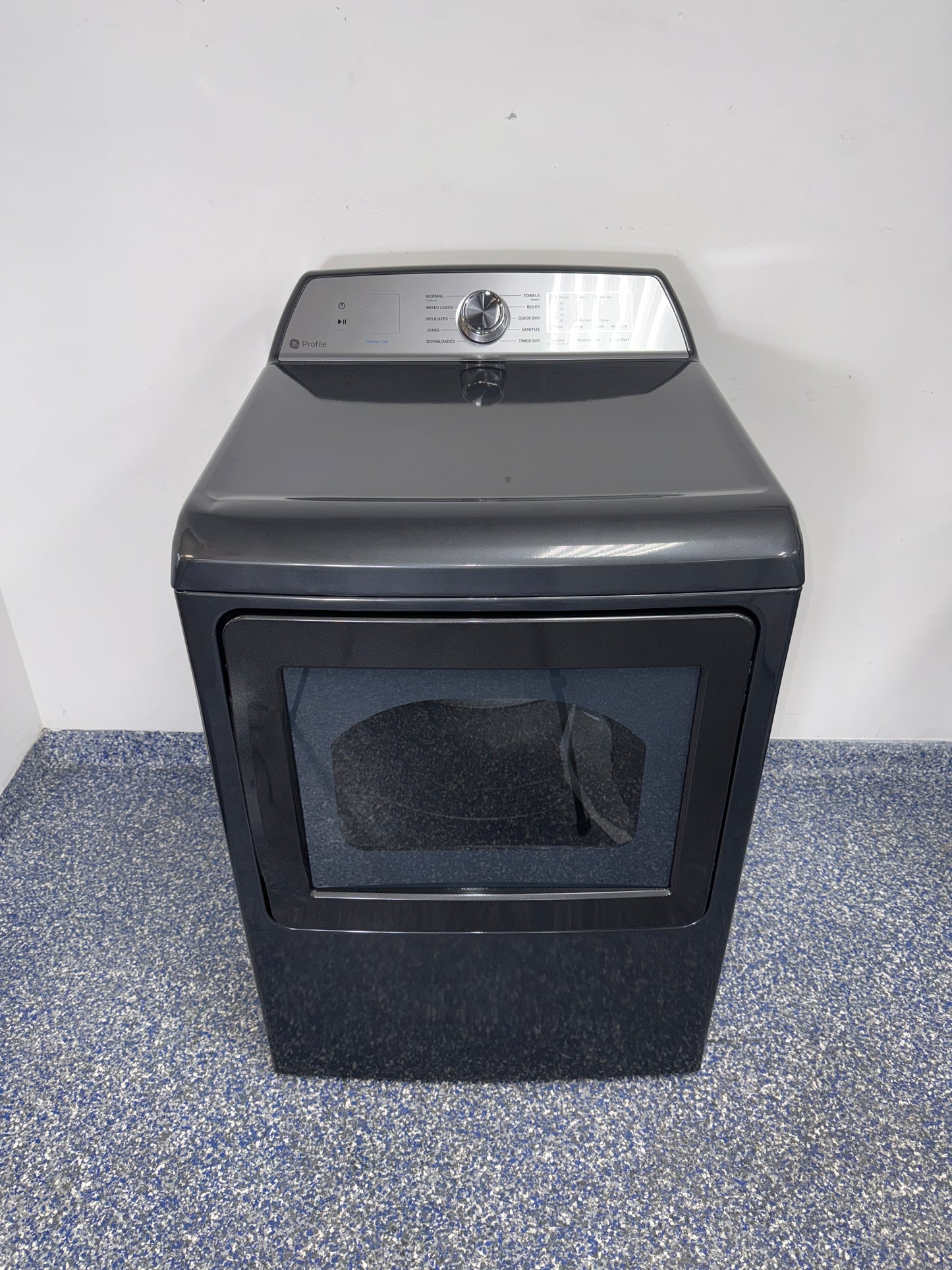 Front view of the GE Profile PTD60EBPRDG electric dryer in Overland Park, KS.