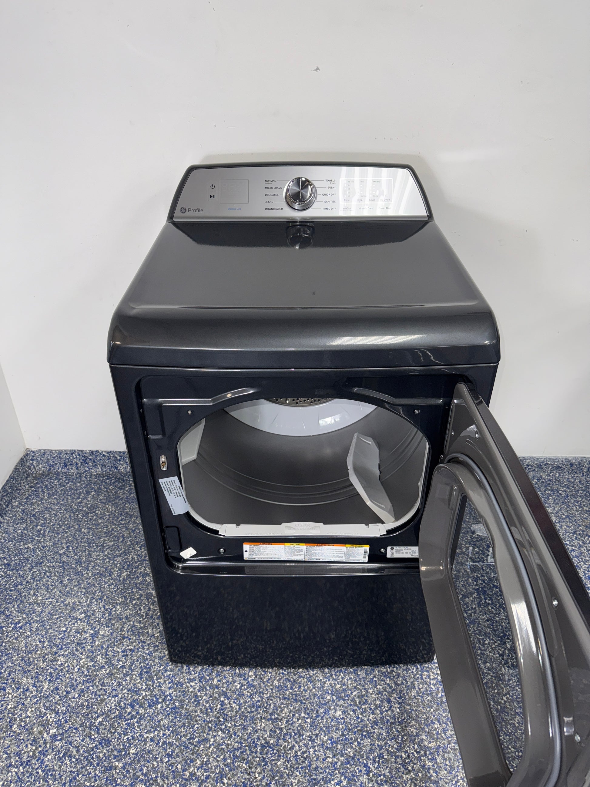 Built-in Wi-Fi SmartHQ® interface of the GE Profile PTD60EBPRDG electric dryer near Kansas City.