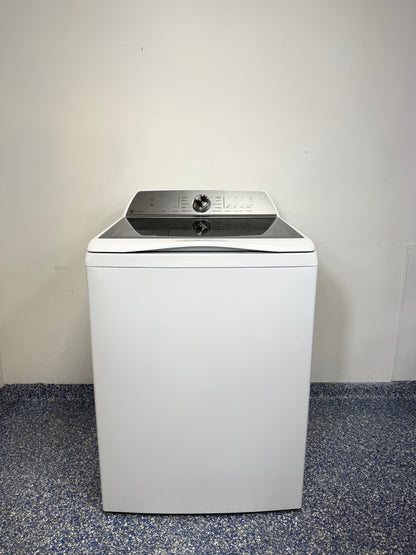 A full frontal image of the GE Profile PTW600BSRWS top-load smart washer, showcasing its clean white finish and glass lid. On sale at Appliance Shark - Scratch & Dent store | Kansas City.
