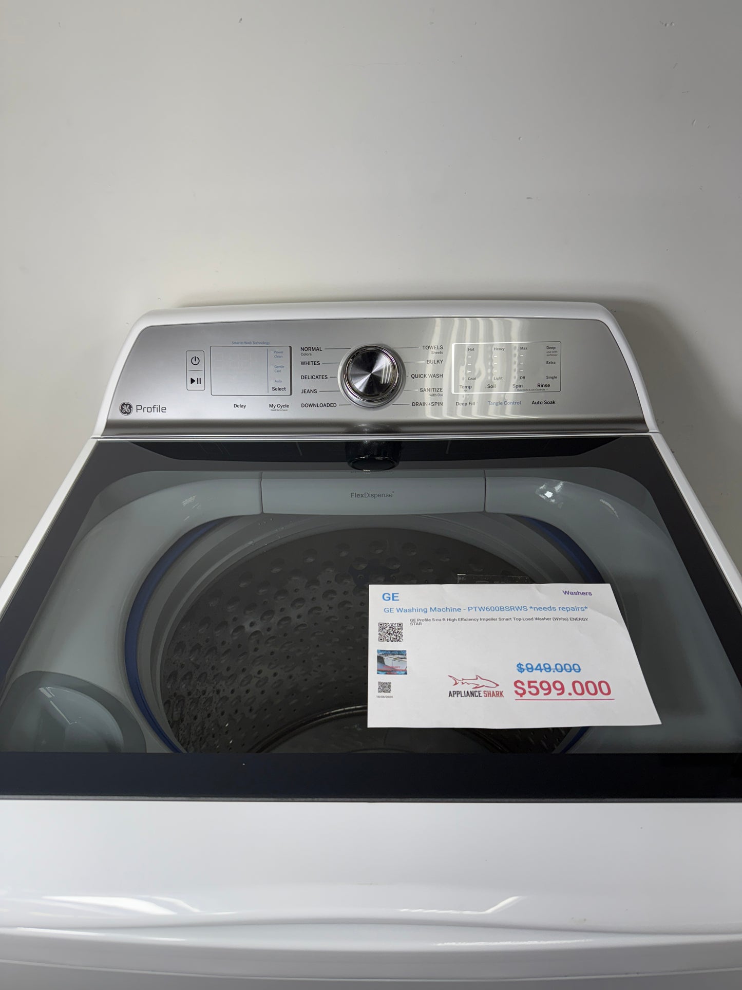 A detailed view of the digital control panel for the GE PTW600BSRWS, showing the cycle selection dial and SmartHQ™ connectivity options. On sale at Appliance Shark - Scratch & Dent store | Kansas City.