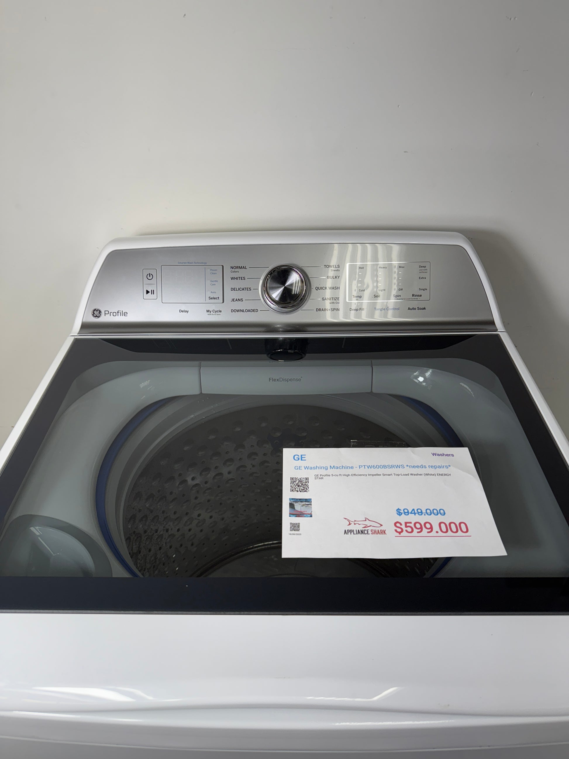 A detailed view of the digital control panel for the GE PTW600BSRWS, showing the cycle selection dial and SmartHQ™ connectivity options. On sale at Appliance Shark - Scratch & Dent store | Kansas City.