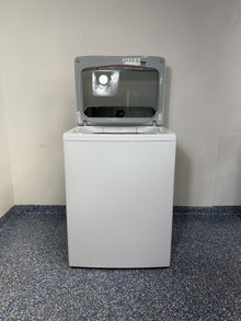 An overhead shot of the GE PTW600BSRWS with the lid open, revealing the spacious stainless steel wash basket and Impeller. On sale at Appliance Shark - Scratch & Dent store | Kansas City.