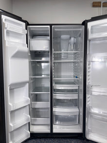 A close-up view of the external ice and water dispenser on the GE refrigerator, model GSS25IYNFS, an ideal appliance for homes in Overland Park.
