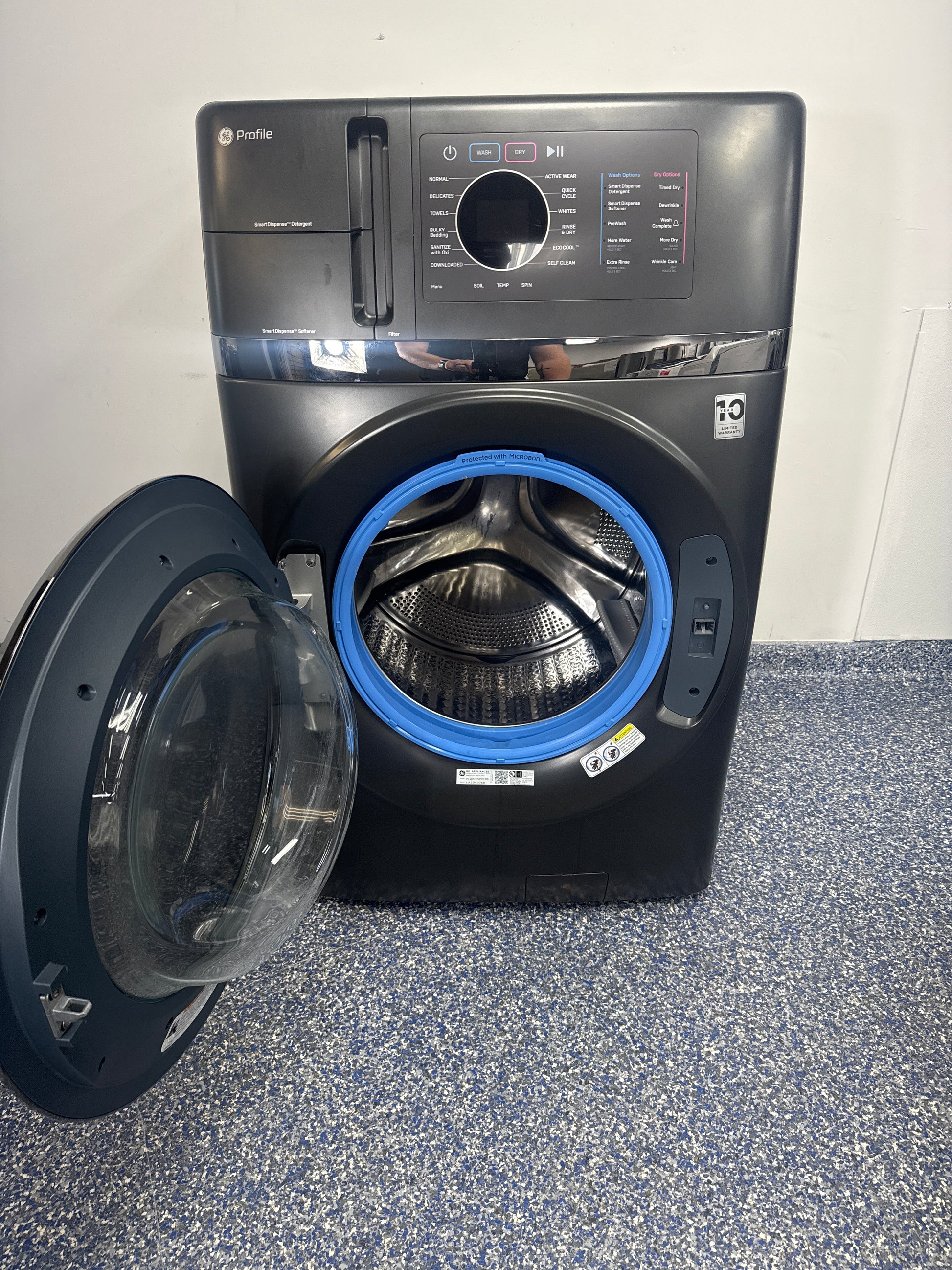 GE PROFILE PFQ97HSPVDS washer-dryer combo front view Carbon Graphite finish Kansas City laundry room