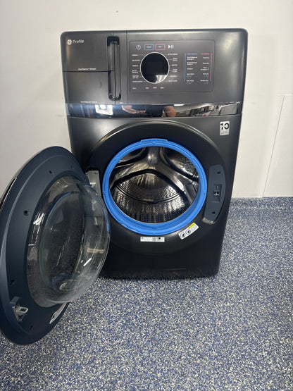 GE PROFILE PFQ97HSPVDS washer-dryer combo front view Carbon Graphite finish Kansas City laundry room