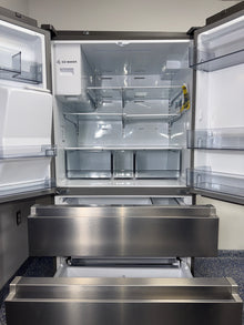 The interior of the HISENSE refrigerator, model HRM260N6TSE, showing its icemaker, an ideal appliance for homes in Overland Park.