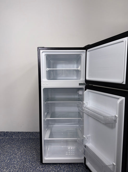 Interior of HISENSE HRT044VE mini fridge with adjustable shelves and freezer compartment, discounted at Appliance Shark in Kansas City.