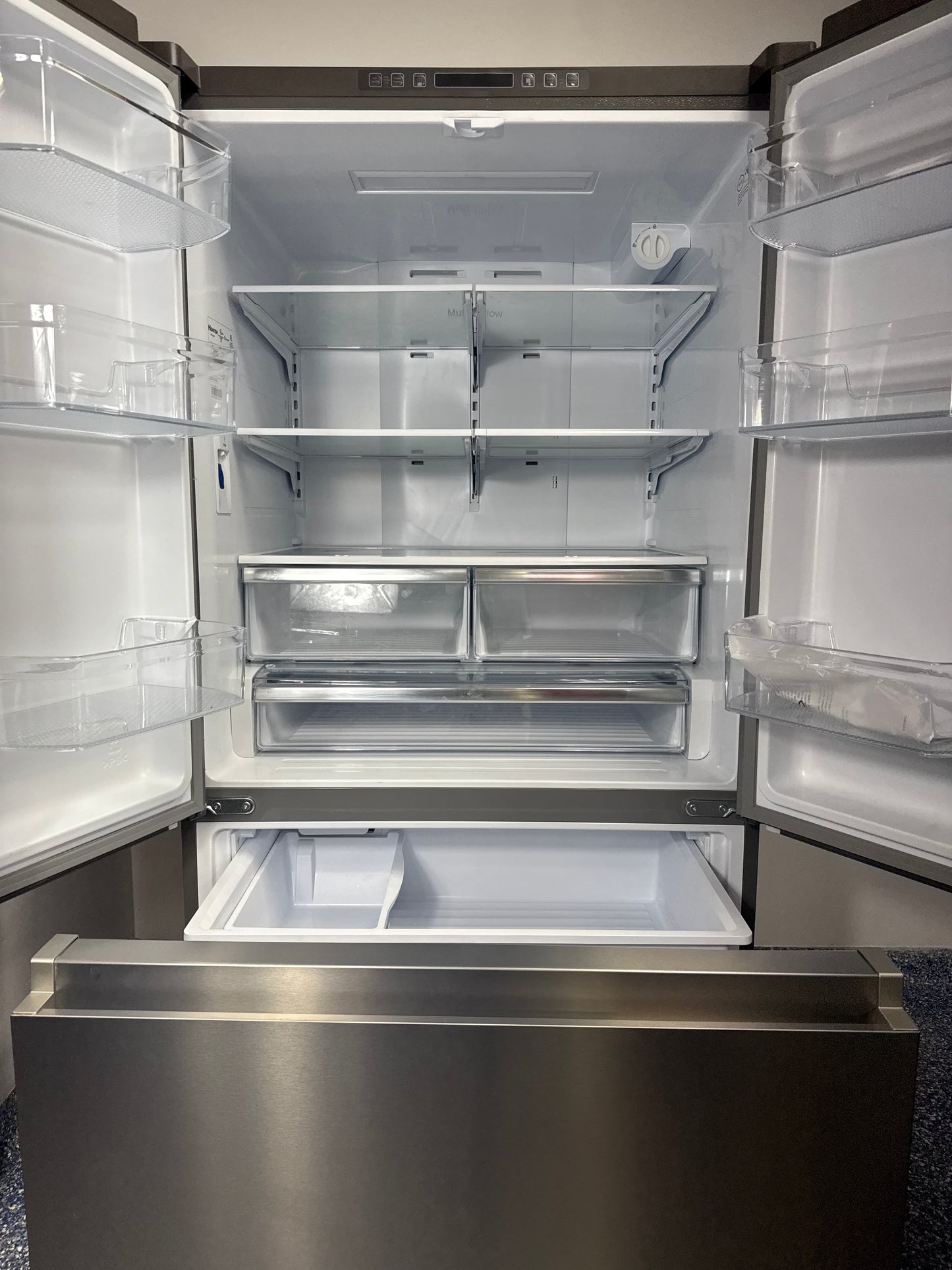 Scratch & dent HISENSE HRF266N6CSE1 refrigerator displayed at Appliance Shark in Overland Park with premium French door styling.