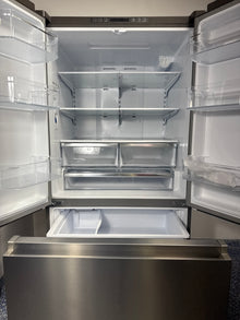 Scratch & dent HISENSE HRF266N6CSE1 refrigerator displayed at Appliance Shark in Overland Park with premium French door styling.