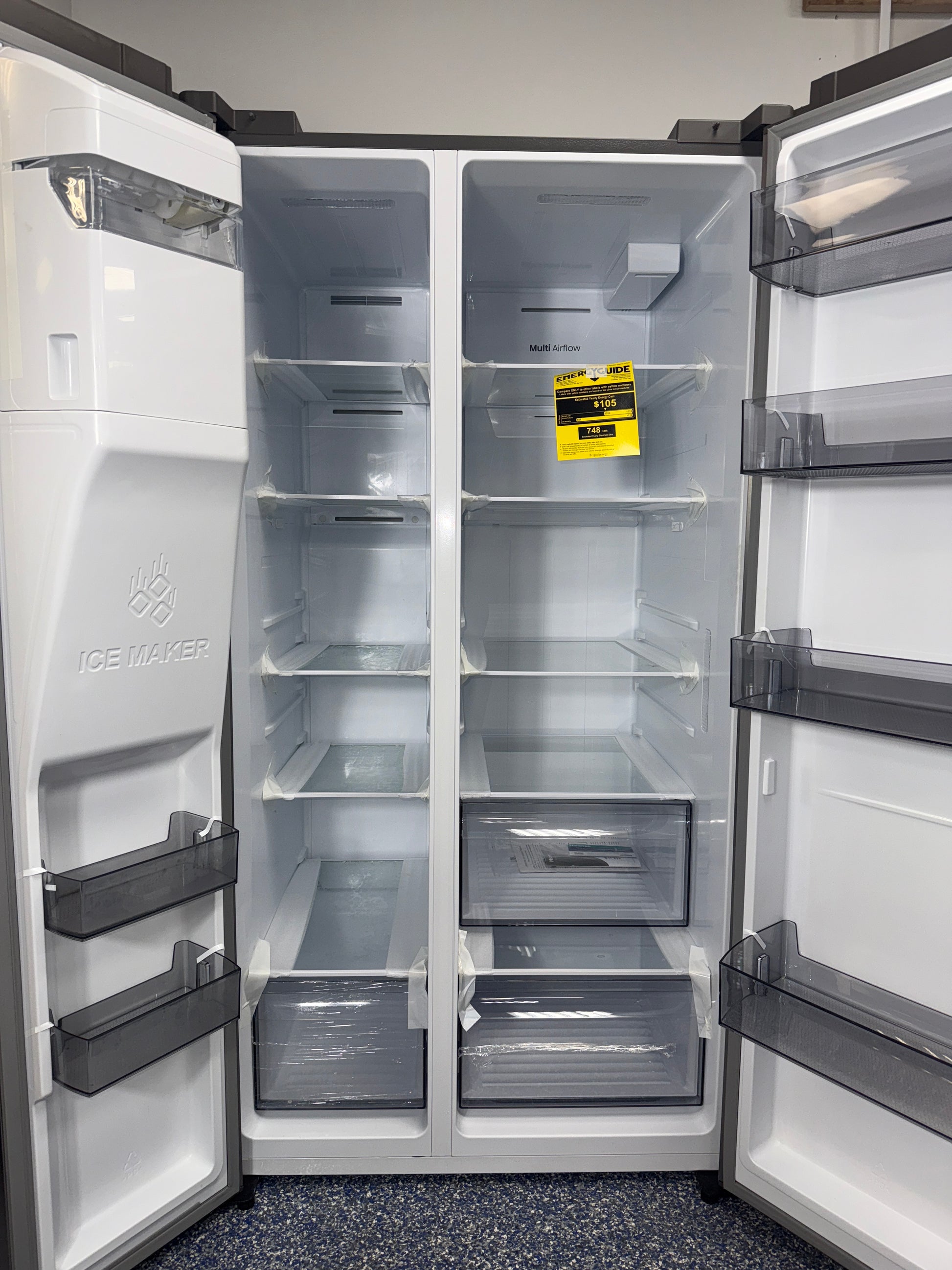 A close-up view of the filtered ice and water dispenser on the HISENSE refrigerator, model HRS290P5FSE, an ideal appliance for homes in Overland Park.