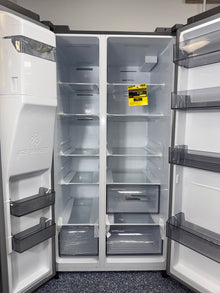 A close-up view of the filtered ice and water dispenser on the HISENSE refrigerator, model HRS290P5FSE, an ideal appliance for homes in Overland Park.