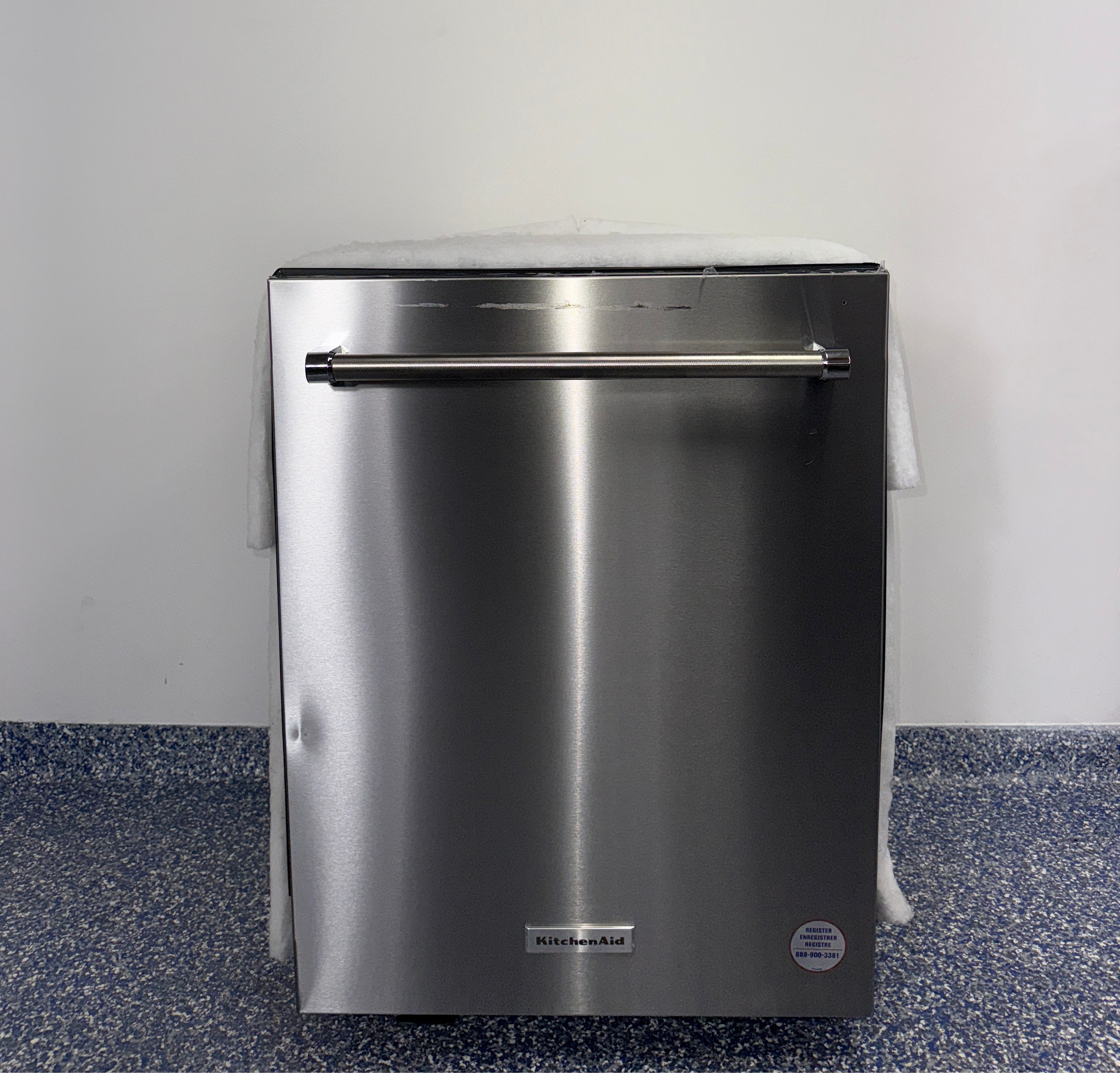 The KITCHENAID KDTM604KPS dishwasher from the front, highlighting its FreeFlex™ Third Rack and a great deal in Kansas.