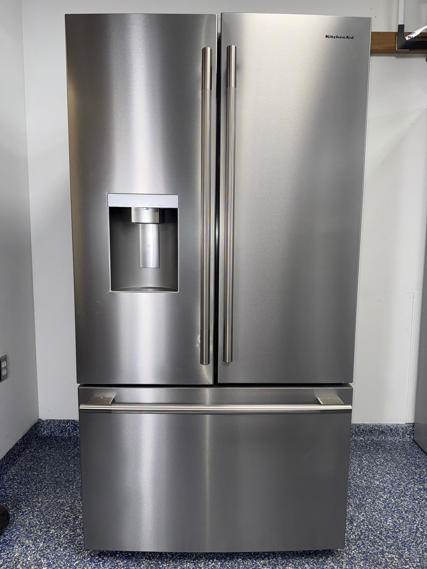 Front view of the KITCHENAID KRFF436SPS French door refrigerator with stainless steel finish in a Kansas City kitchen.