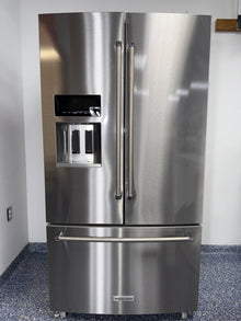 The KITCHENAID KRFF577KPS refrigerator from the front, a French door model for a great deal in Kansas.