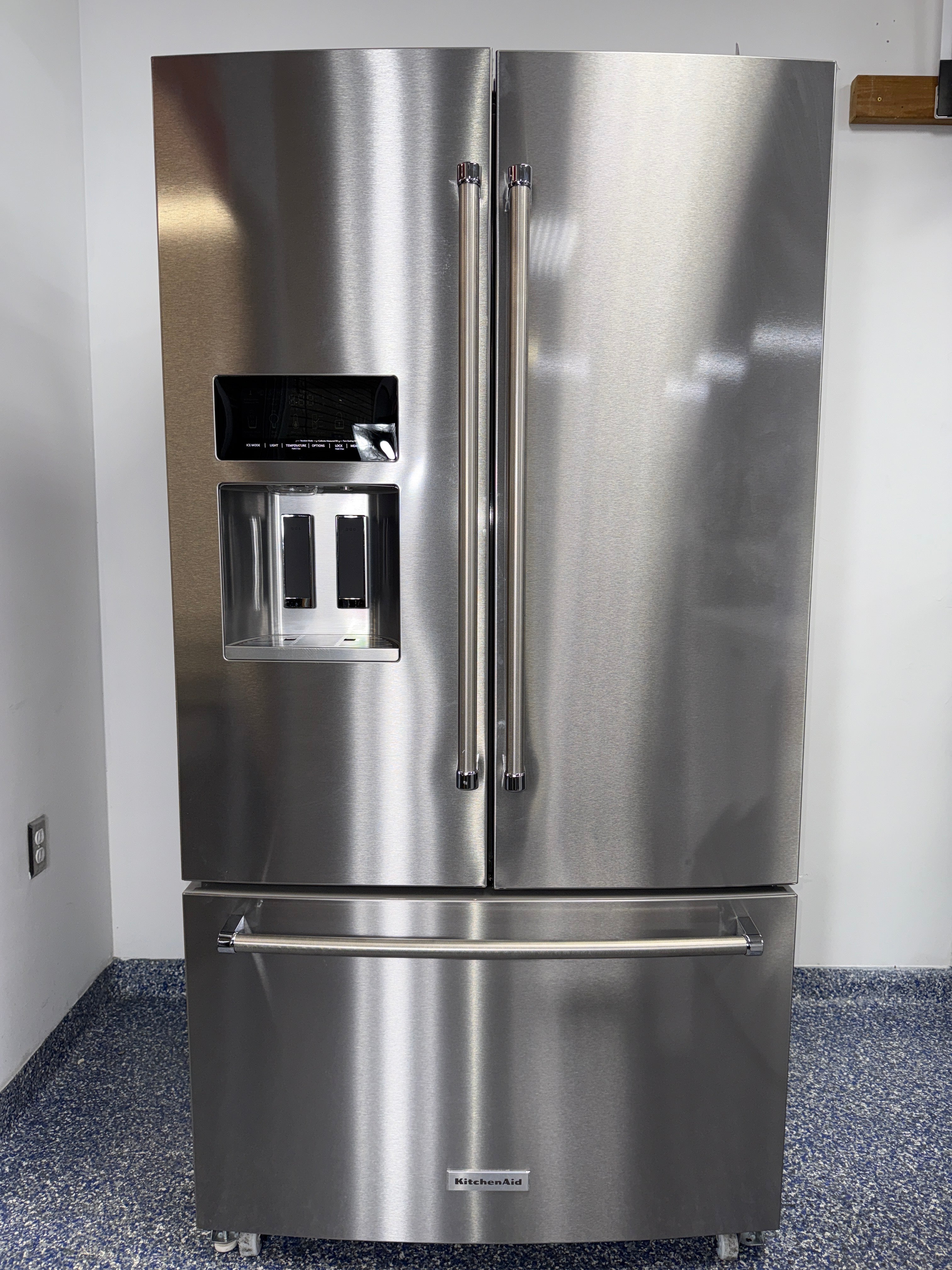 The KITCHENAID KRFF577KPS refrigerator from the front, a French door model for a great deal in Kansas.