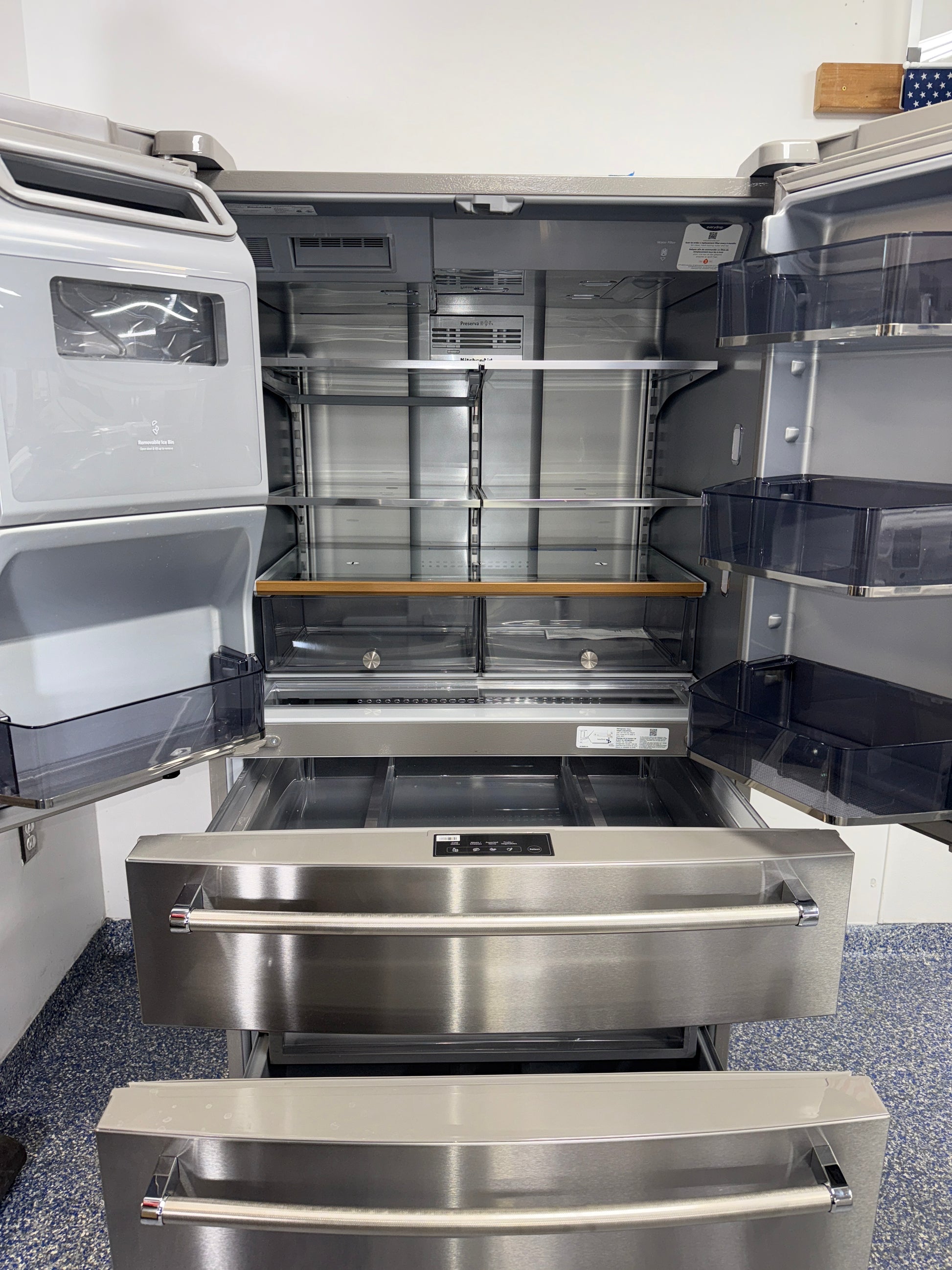 Internal water dispenser of the KITCHENAID KRMF536RPS French door refrigerator serving the Kansas City Metro area.