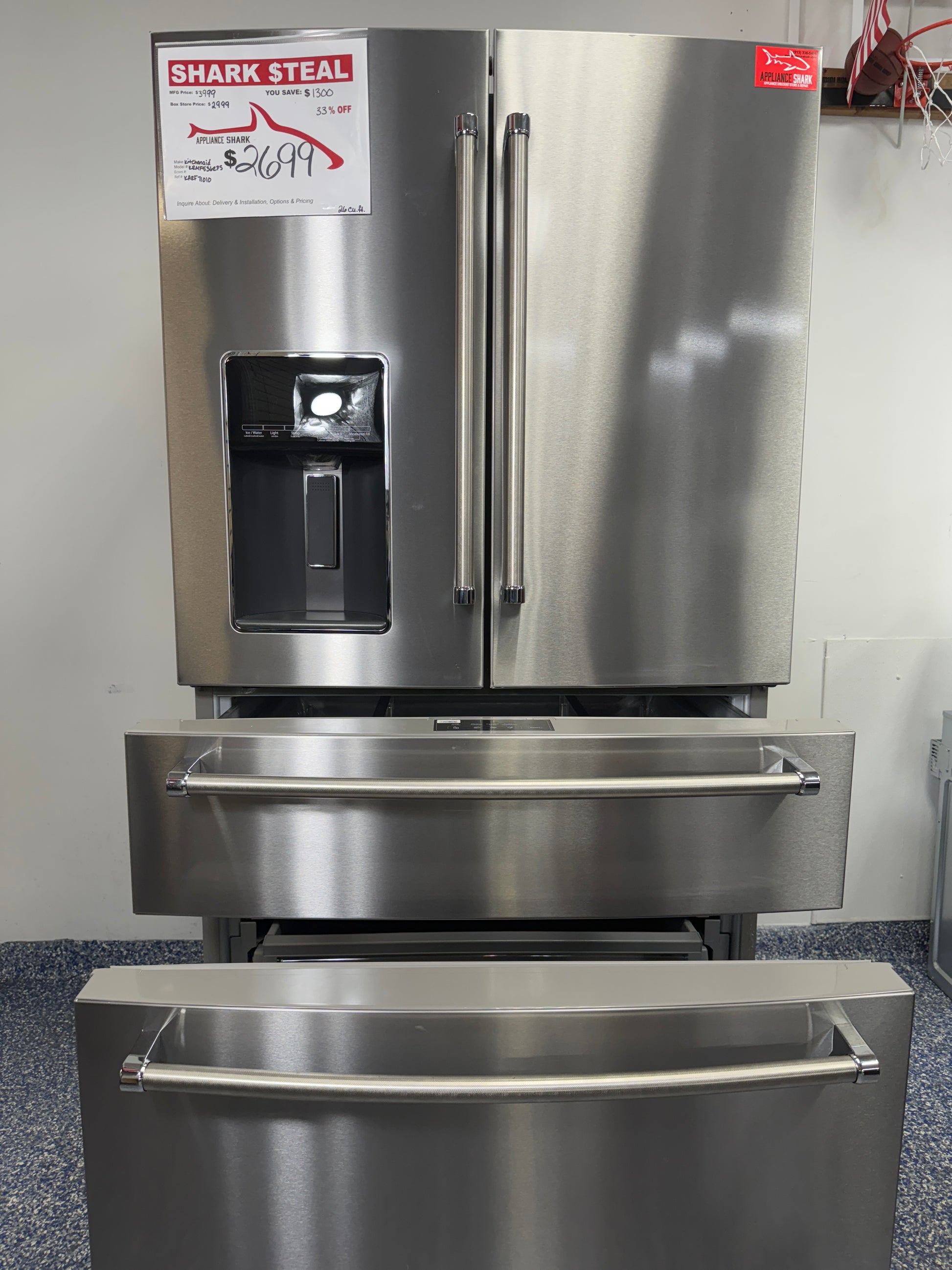 Open view of the freezer drawer of the KitchenAid KRMF536RPS refrigerator, showcasing the two-tier storage and dedicated ice maker. On sale at Appliance Shark - Scratch & Dent store | Kansas City.