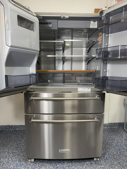 Interior view of the main refrigerator compartment of the KitchenAid KRMF536RPS, highlighting the Preserva Food Care System and adjustable storage. On sale at Appliance Shark - Scratch & Dent store | Kansas City.