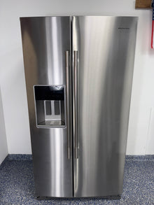 Front view of the KITCHENAID KRSC536RPS00 side-by-side refrigerator with stainless steel finish in a Kansas City kitchen.