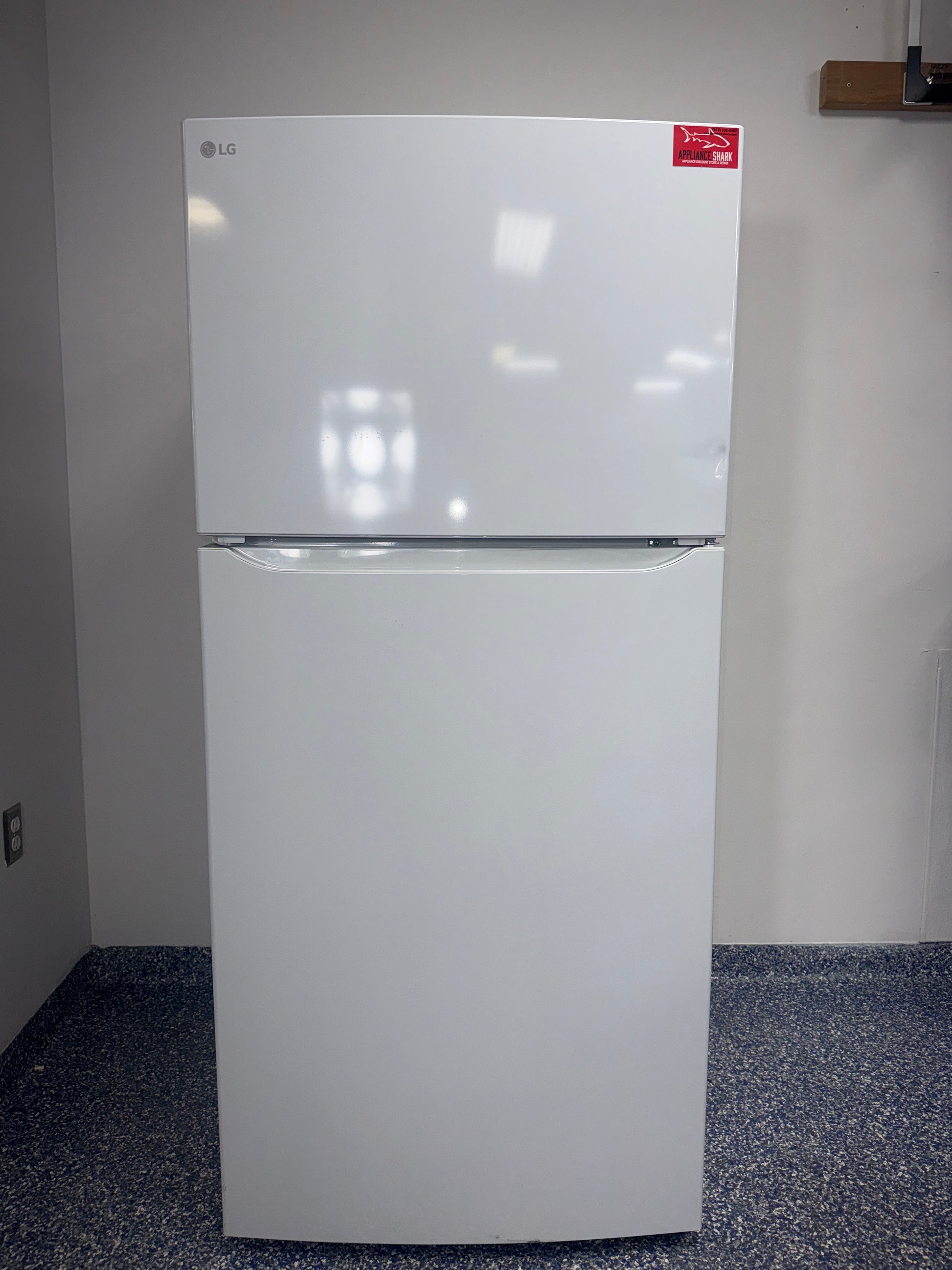The interior of the LG LTCS20020W refrigerator, showing its spacious 20 cu. ft. capacity, an ideal appliance for homes in Overland Park.