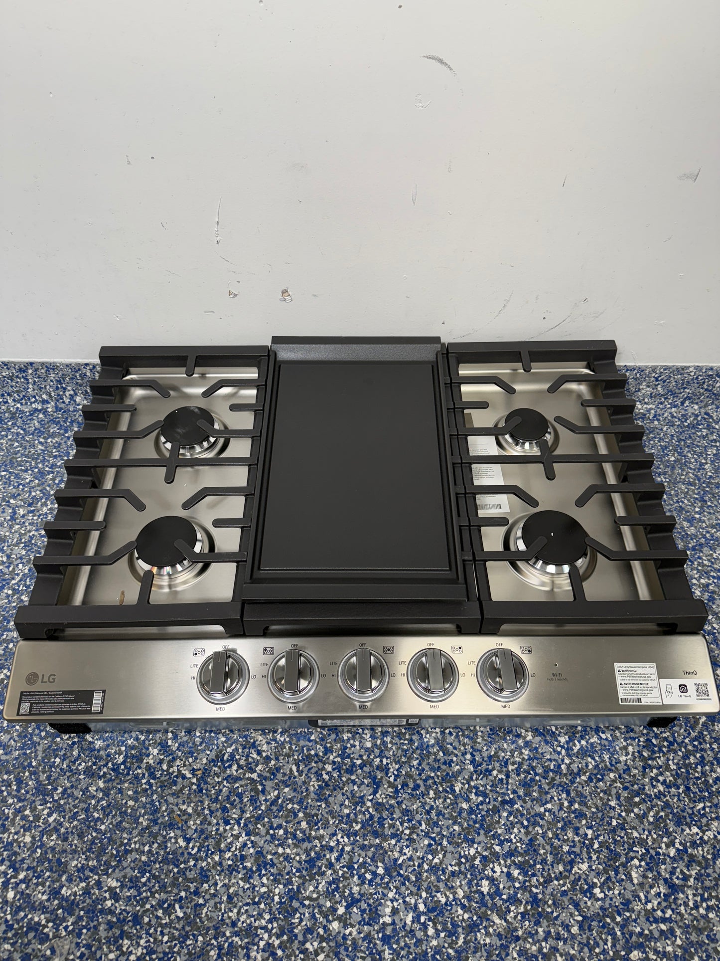 LG CBGJ3027S gas cooktop burners and grates in Kansas City