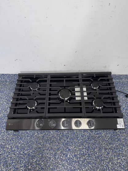 LG CBGJ3623D gas cooktop burners and continuous cast-iron grates in Kansas City