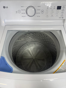 A close-up view of the control panel on the LG WT7000CW washer, showing its ColdWash™ Technology and SlamProof® Lid, perfect for an Overland Park, KS home.