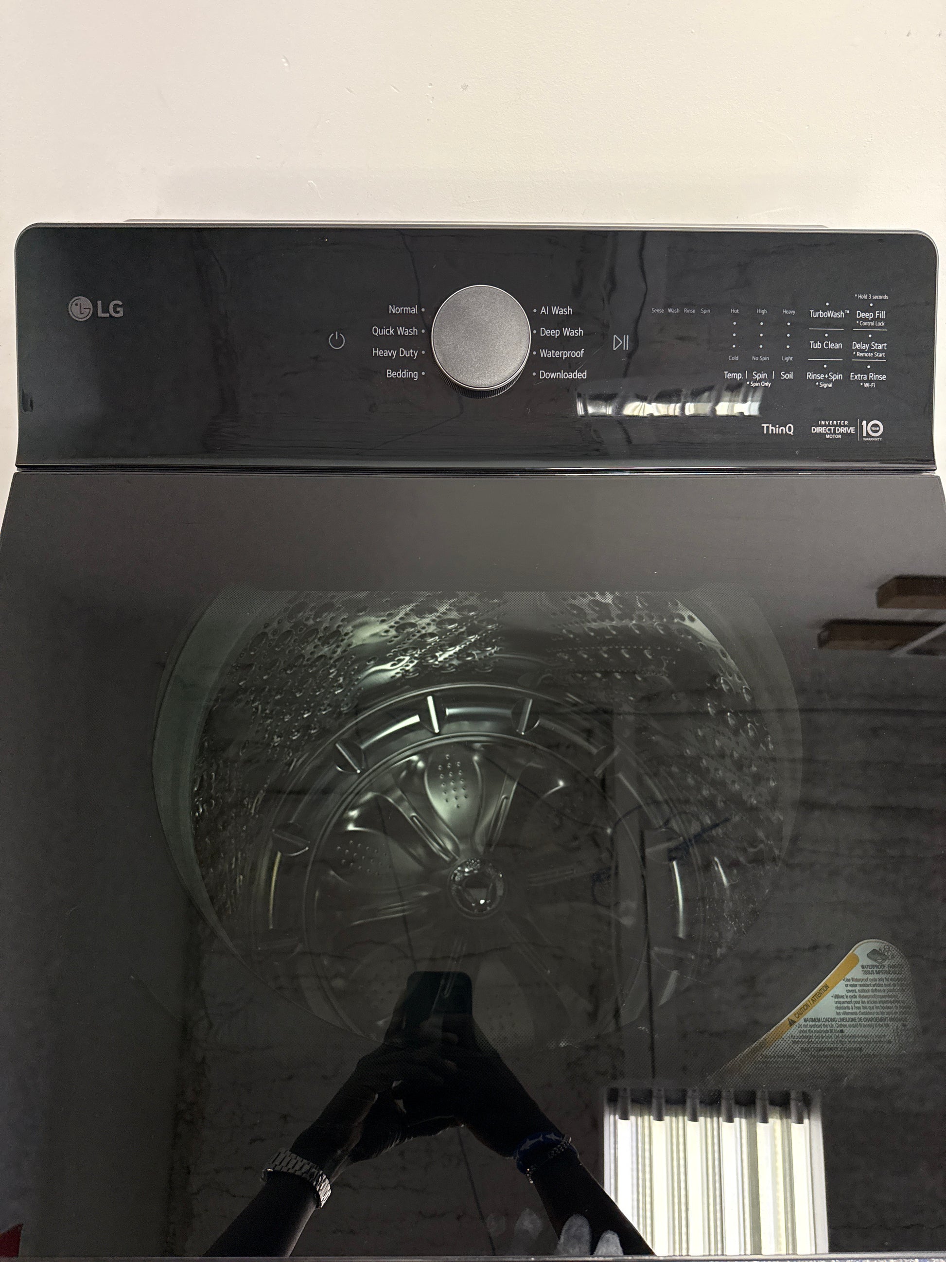 The LG 5.5 cu. ft. top load washer, model WT8400CB, featuring the Deep Fill option, available at Appliance Shark.