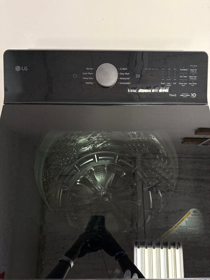 The LG 5.5 cu. ft. top load washer, model WT8400CB, featuring the Deep Fill option, available at Appliance Shark.
