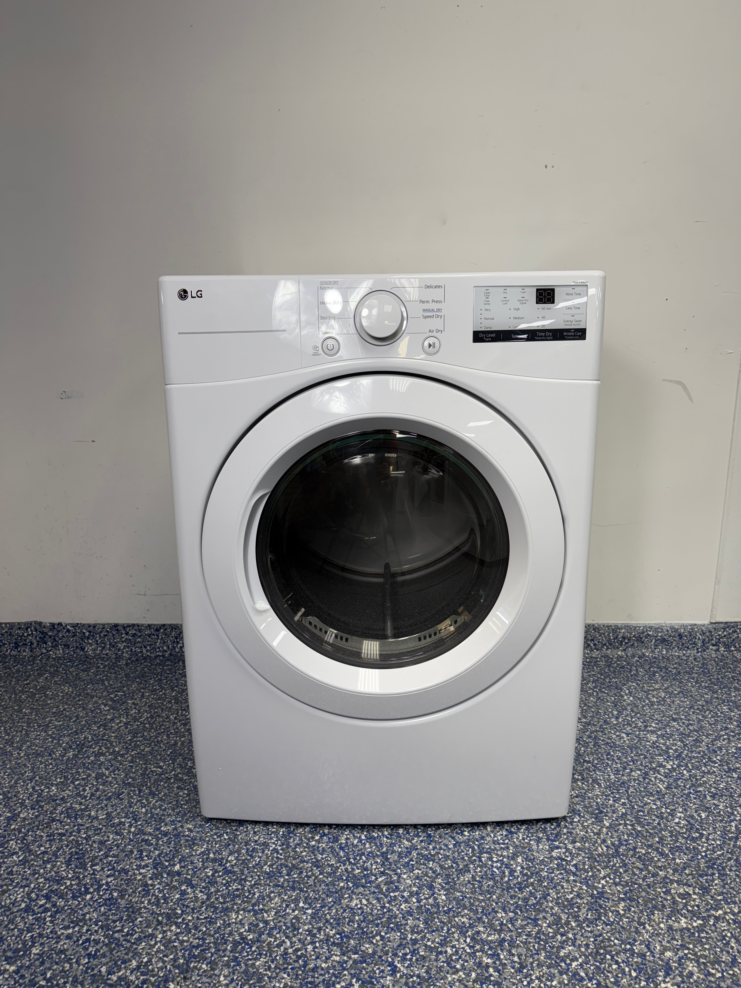 Front view of the LG DLE3400W front load dryer in Overland Park, KS.