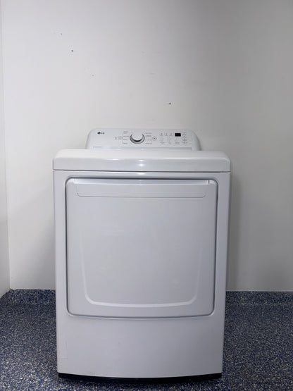 A front view of the LG DLE7000W dryer, highlighting its durable Aluminized Alloy Steel Drum, ready for installation in a Kansas City laundry room.