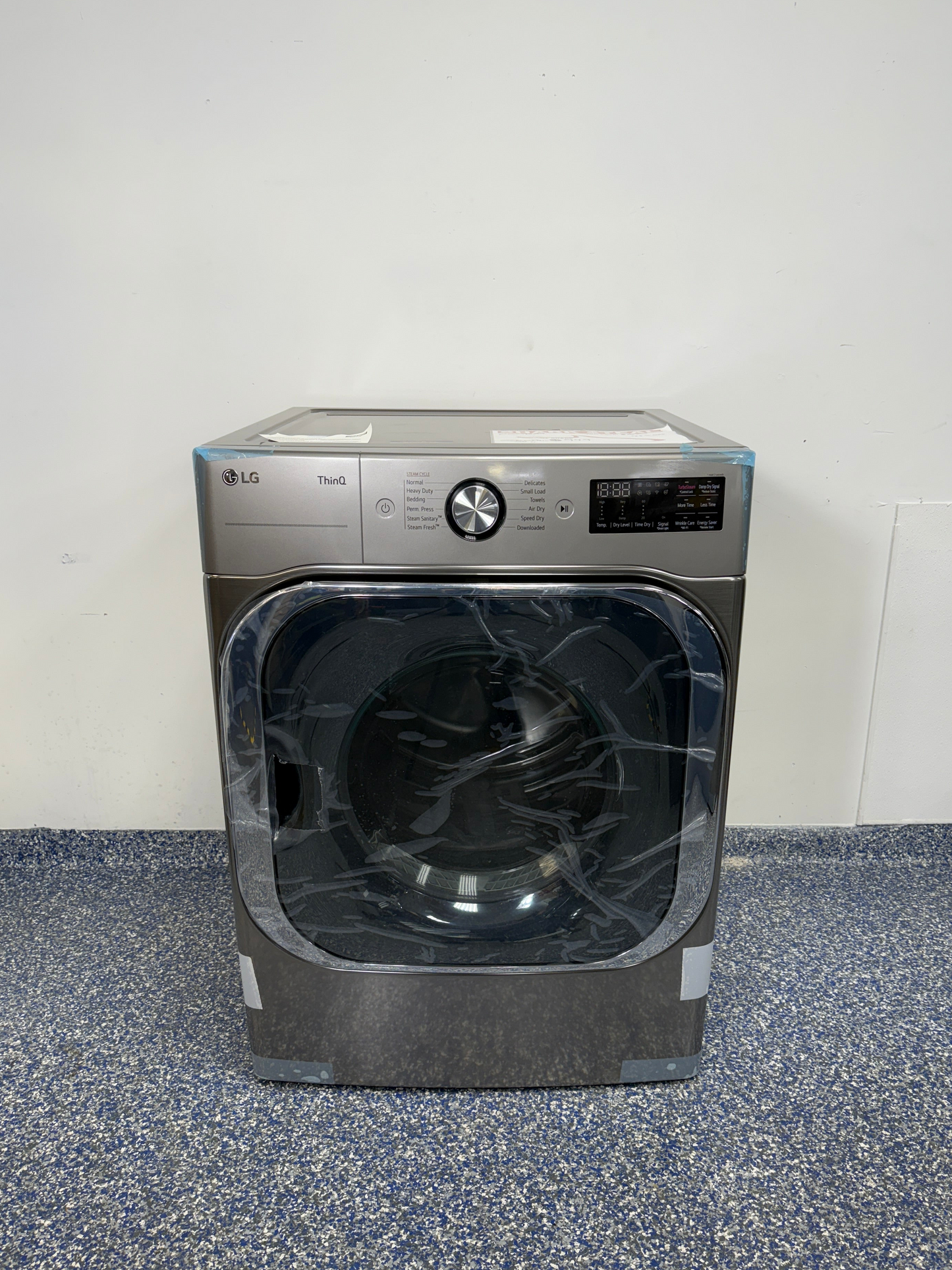 Front view of the LG DLGX8981V 9.0 cu ft gas dryer in Graphite Steel, available in Overland Park, KS.