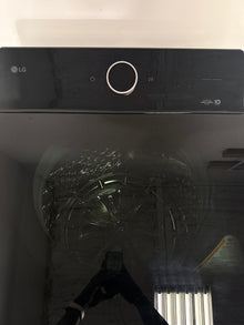A close-up view of the ezDispense® Automatic Dispenser feature on the LG WT8600CB washer, perfect for an Overland Park, KS home.