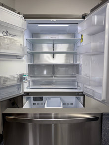 The LG LCFC26XSS refrigerator, with a focus on its Smart Inverter Compressor, for sale in Kansas.