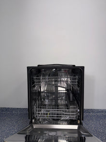 QuadWash® spray arm system inside LG LDFC2423W dishwasher, available as a scratch and dent deal in Kansas City.