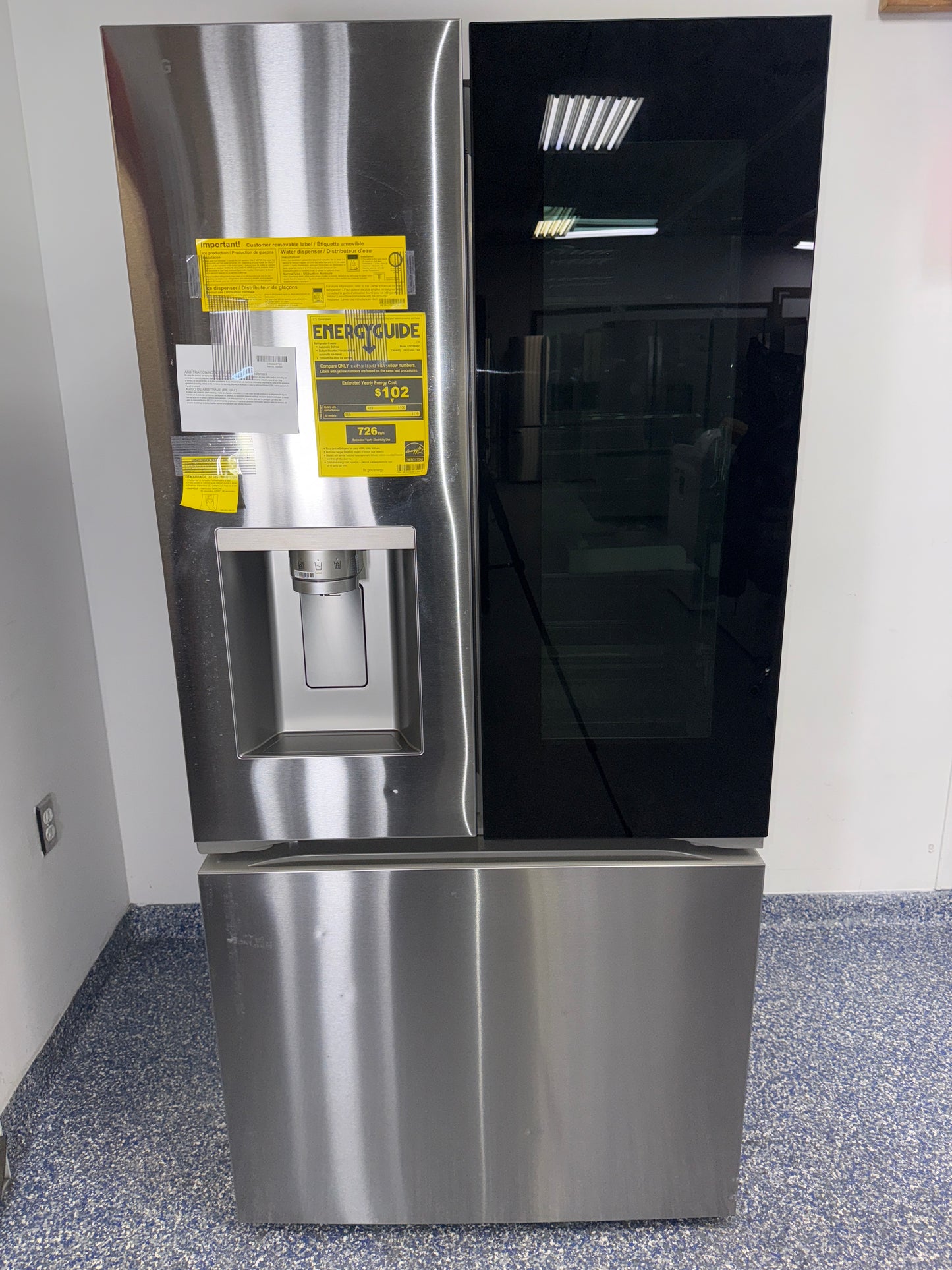 LG LF25S6560S door showing the InstaView® tinted glass panel and Door-in-Door® compartment in Overland Park.