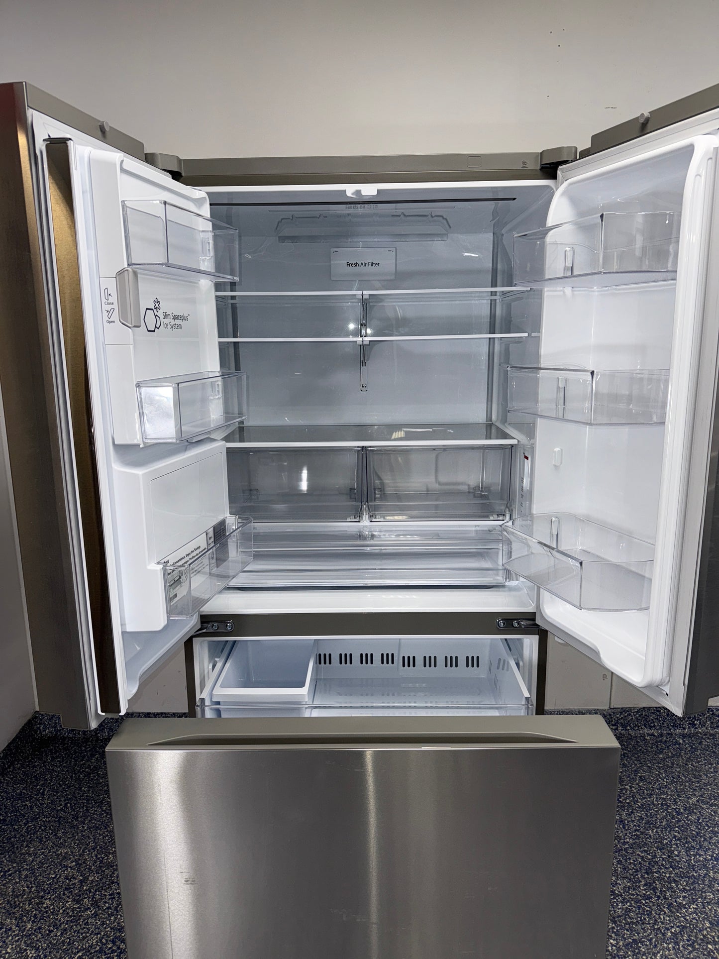 LG LF26C6230V French door refrigerator exterior water and ice dispenser in Overland Park near Kansas City