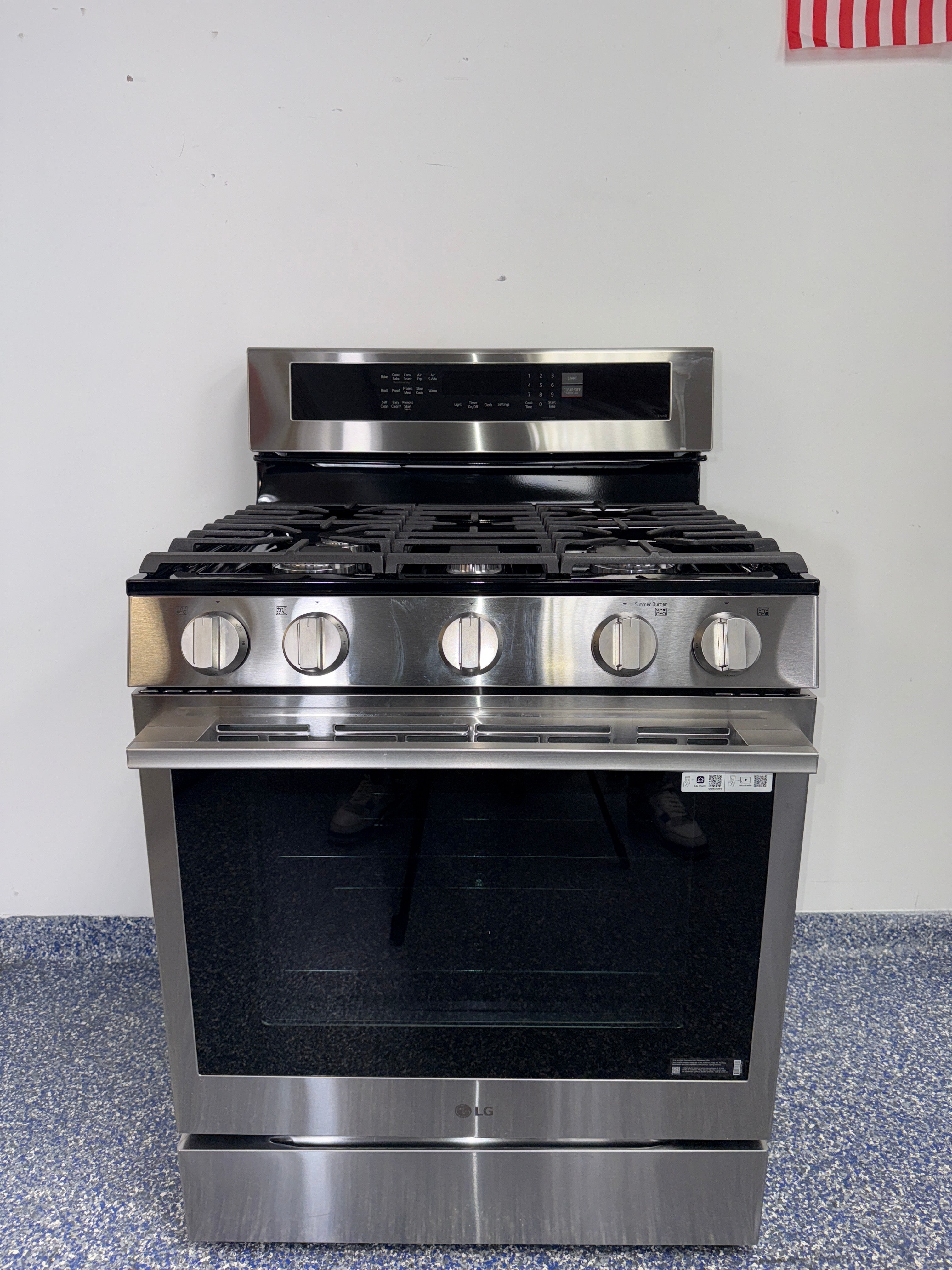 Front view of the LG LRGN6325X 30-inch smart gas range in PrintProof® Stainless Steel, available in Overland Park, KS.