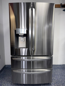 A view of the dual icemaker inside the LG LRMXS2806S refrigerator, for sale in Kansas.