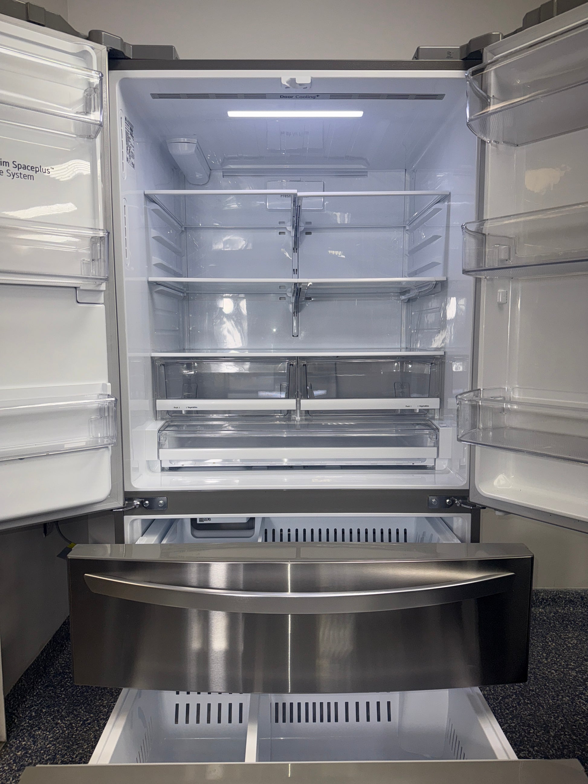 A view of the LG LRMXS2806S refrigerator's SmartDiagnosis™ feature, ready for installation in a Kansas City kitchen.